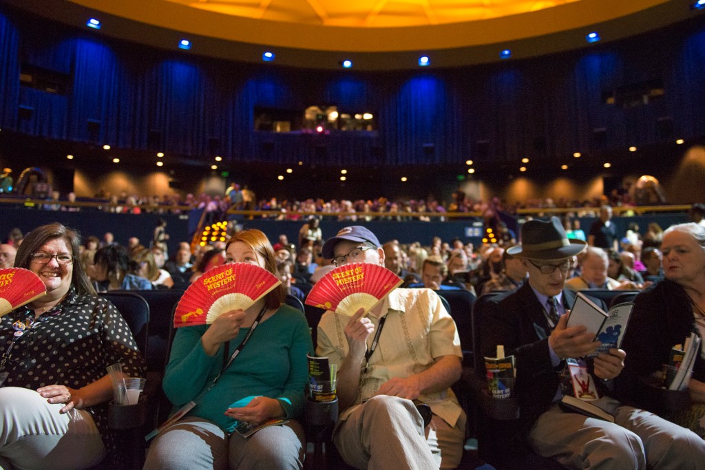 Scent of Mystery in participatory Smell-O-Vision! at the TCM Classic Film Festival in Los Angeles, USA, 2016. Audiences sniff their scented fans.