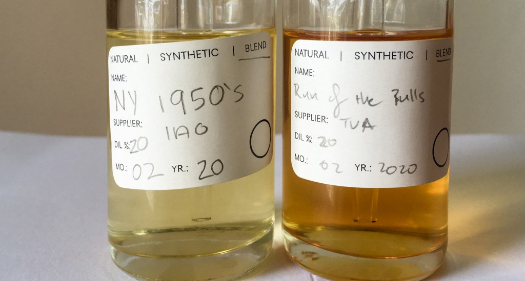 Close-up of two perfume bottles of key fragrances in the scented documentary. On the left is New York City in the 1950s, and on the right is the Run of the Bulls in Spain.